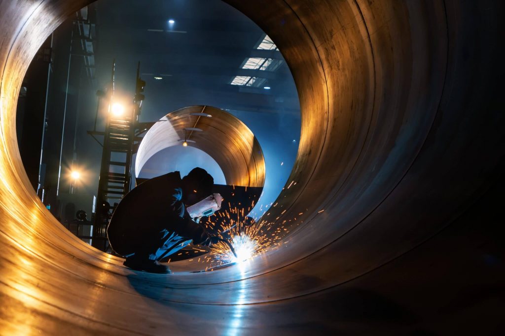 welder is welding steel plates